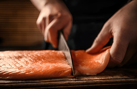 Chef Cutting Salmon